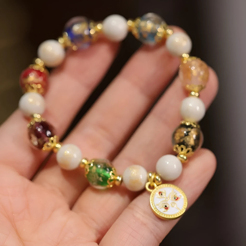 Handmade glazed glass bracelet with Five Gods of Wealth design in 10mm geometry shape.