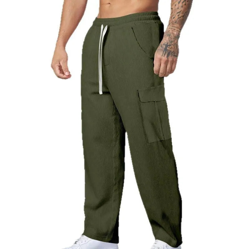 Men's straight-leg corduroy trousers in navy blue with an elasticated drawstring waist.