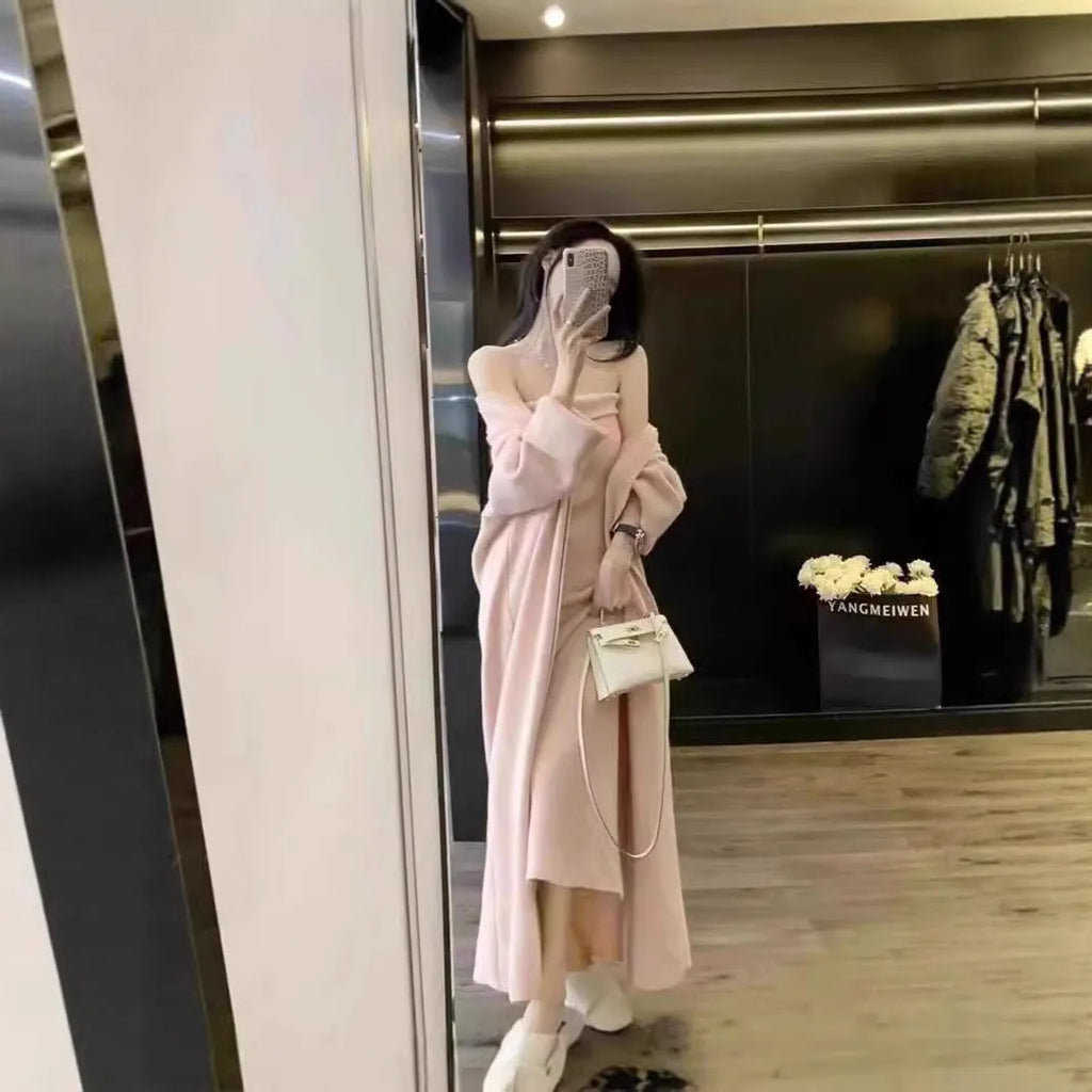 Women's grey knitted dress with matching cardigan coat, featuring regular sleeves and a long skirt.