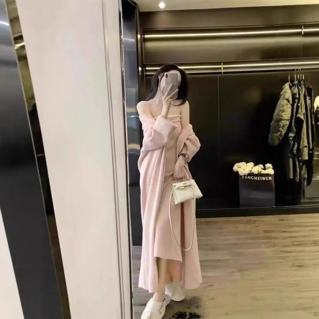 Women's grey knitted dress with matching cardigan coat, featuring regular sleeves and a long skirt.