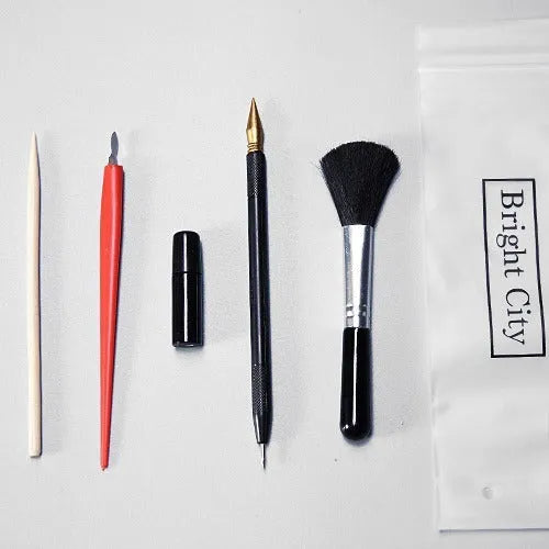 Scratch art painting tool set with white card paper, healing pens, scrapers, and photo frames