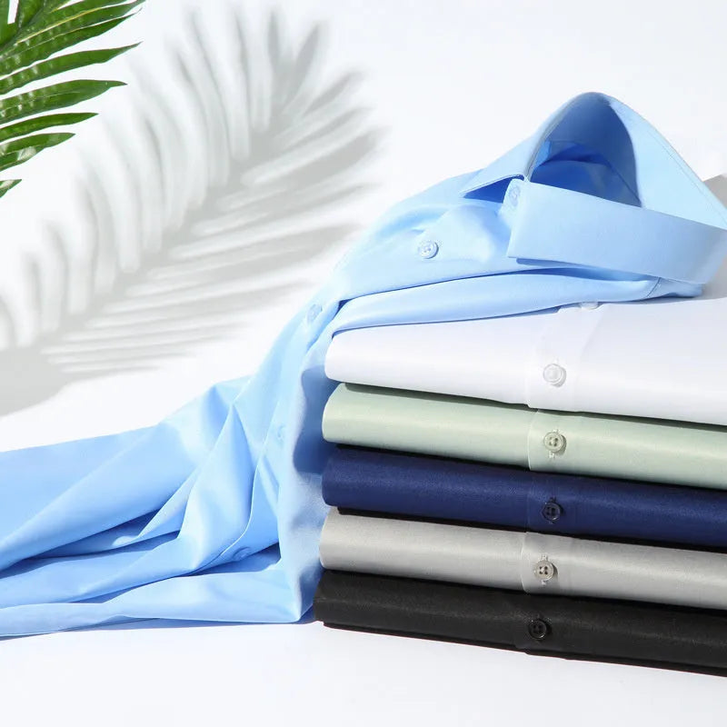 Men's solid colour long-sleeved shirt in a loose, non-ironing polyester and spandex fabric.