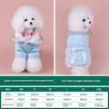 British-style blue cotton winter jacket for dog on wooden background
