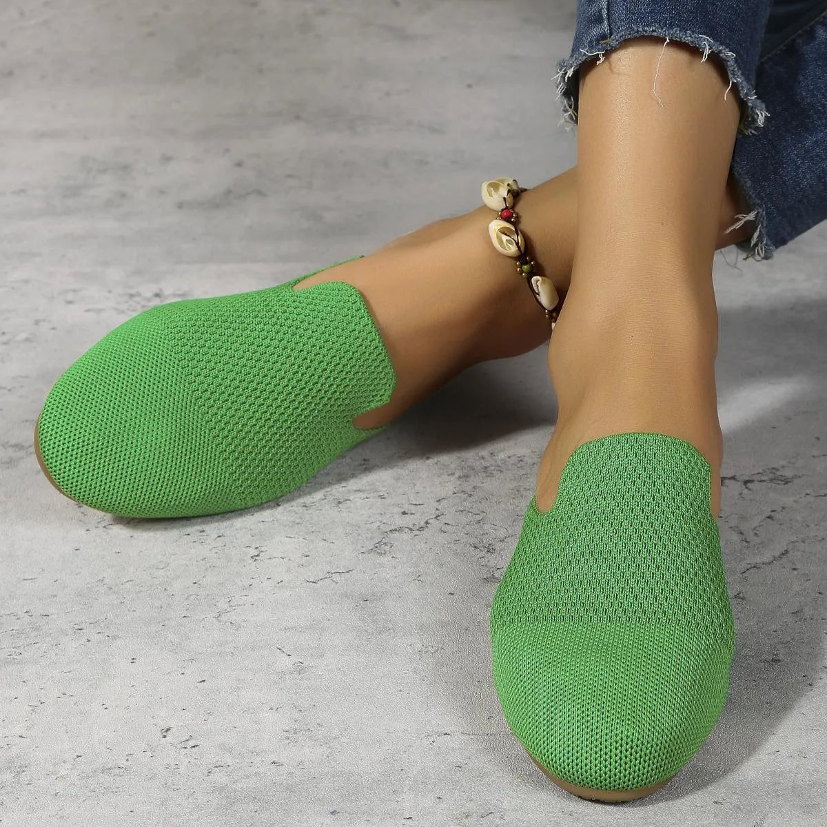 Adult mesh sandals with cloth upper in apricot colour showing slip-on flat sole design