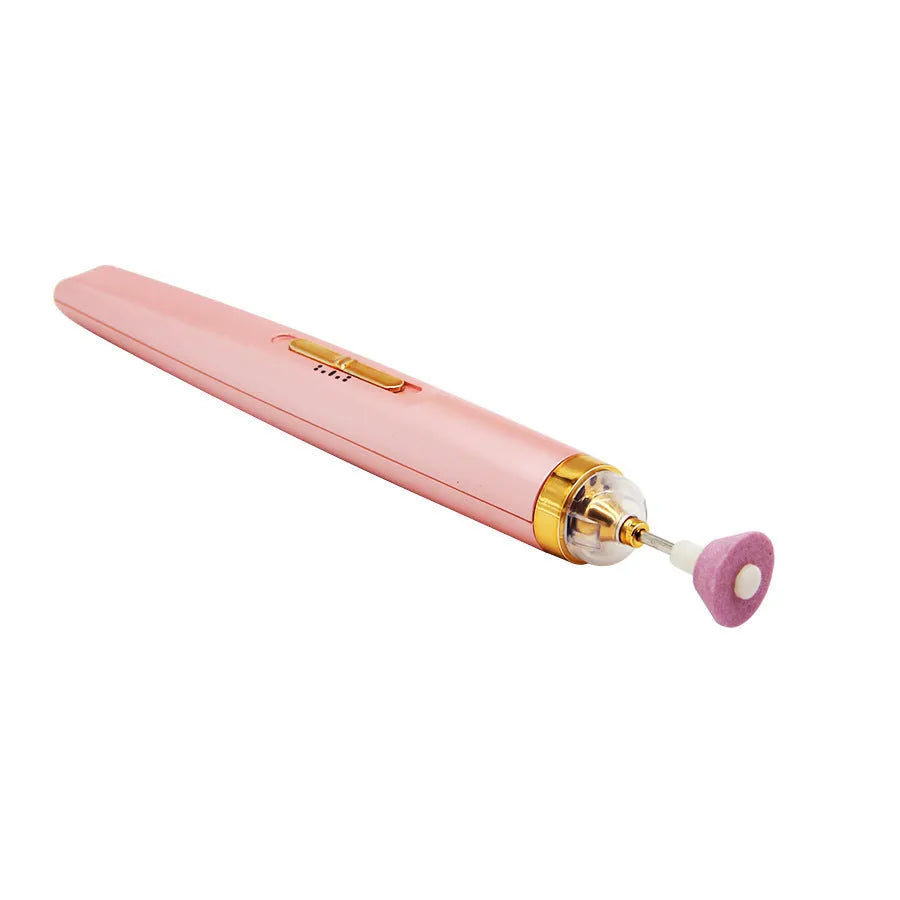 White cordless electric nail drill machine with LED light, five abrasive heads, and a USB charging cable on a pink background.