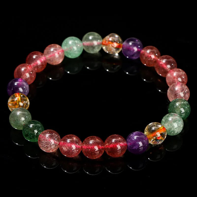A women's bracelet with pink strawberry quartz and natural tourmaline beads in geometric shapes, showing 7mm, 8mm, and 9mm size options.