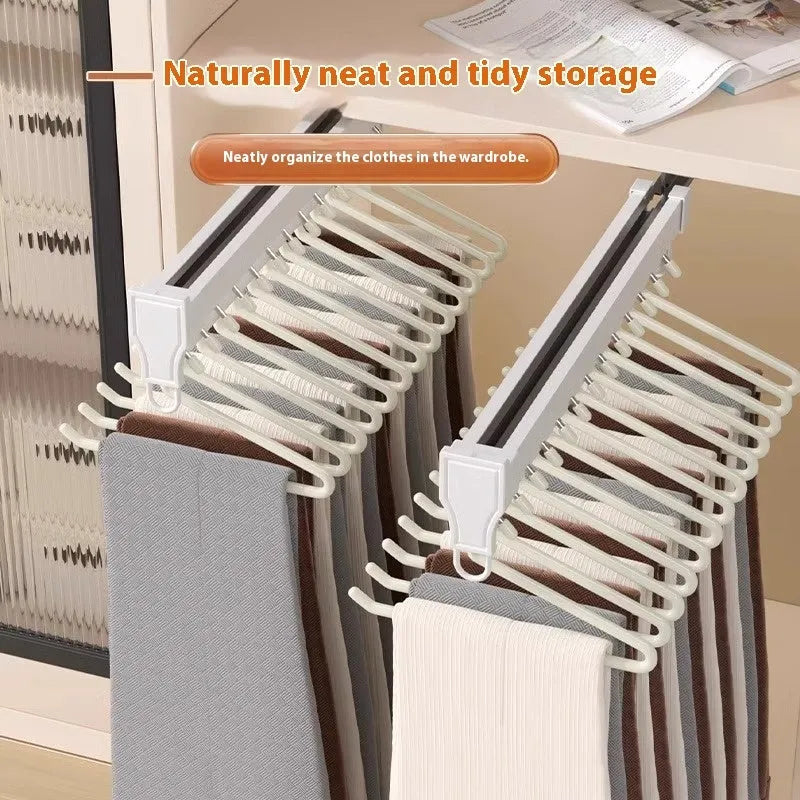Non-slip Z-shaped trouser hanger in stainless steel dipped finish, shown in cream white, green and black