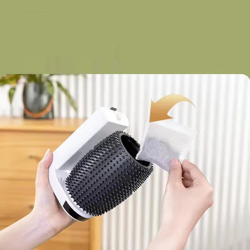 White automatic cat self groomer mounted in corner with silicone bristles for brushing