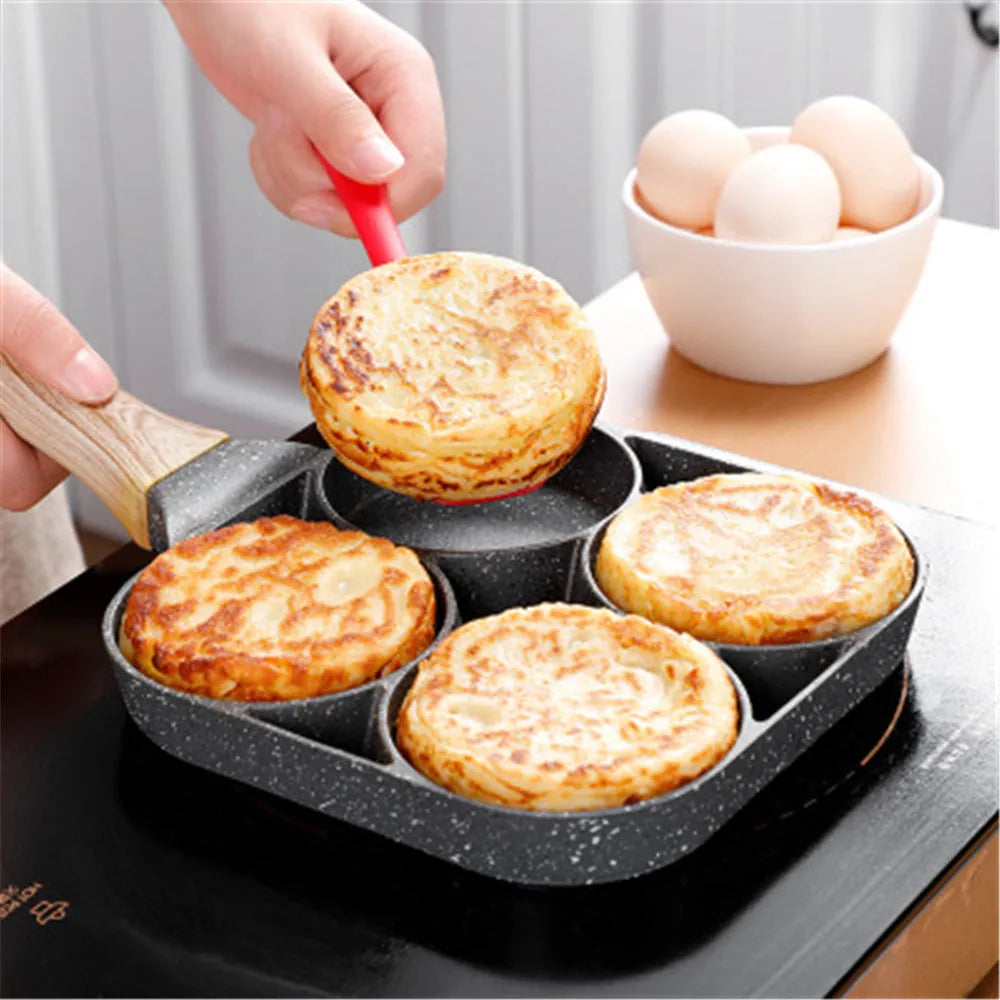 Four-hole non-stick aluminium frying pan with bakelite handle for making omelettes and pancakes