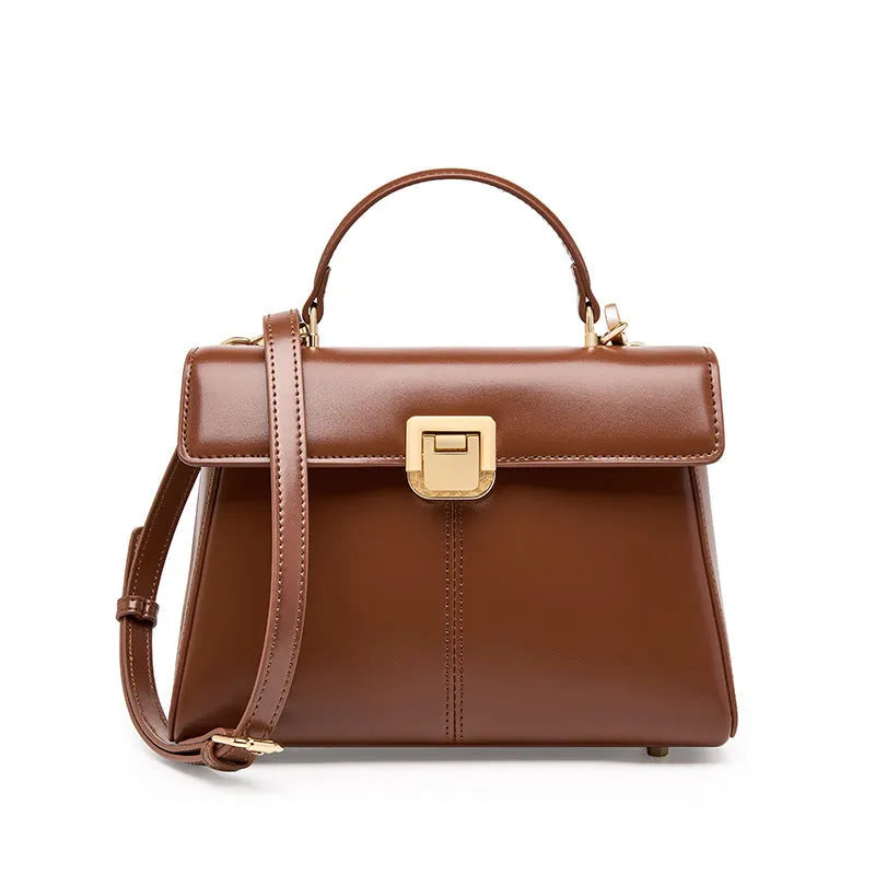 Black genuine leather women's shoulder bag with a front clasp, shown with a detailed view of the internal zip pocket.