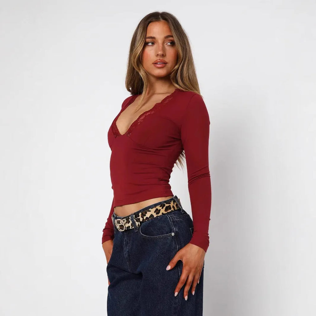 Slim-fit women's long sleeve top with lace floral detailing in black or wine red colours