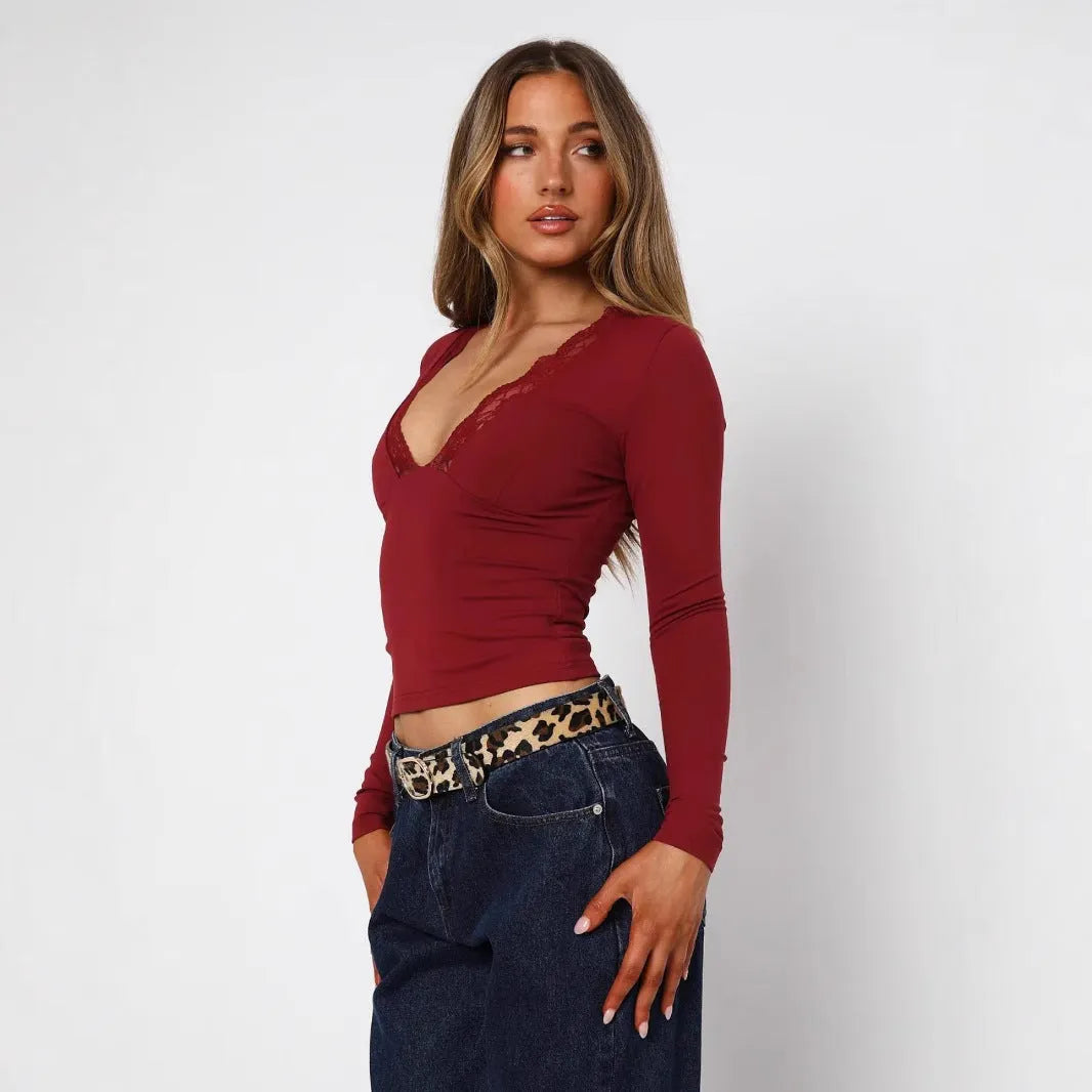 Slim-fit women's long sleeve top with lace floral detailing in black or wine red colours