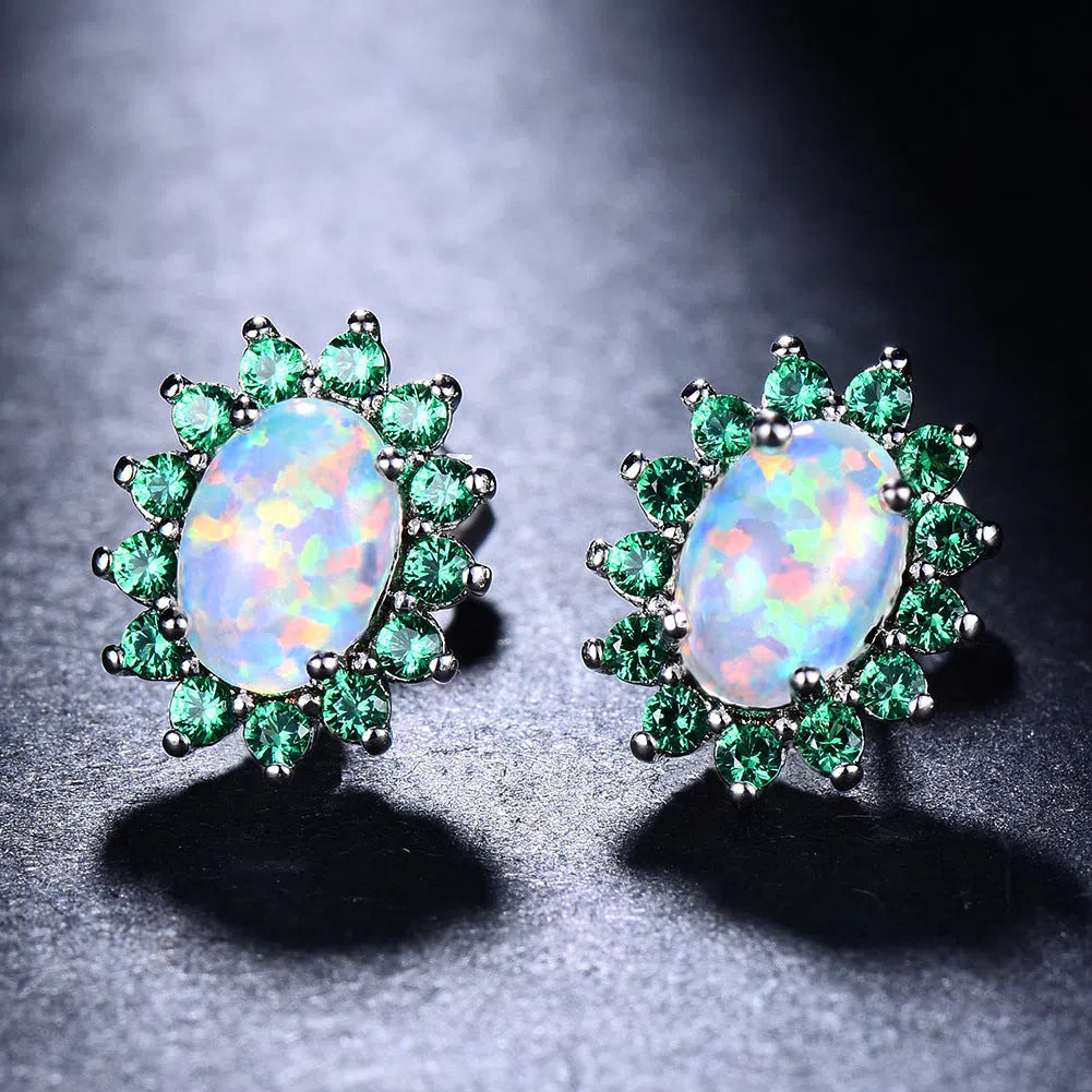 Oval diamond stud earrings in copper with electroplated platinum-tone finish, geometric shape, one pair