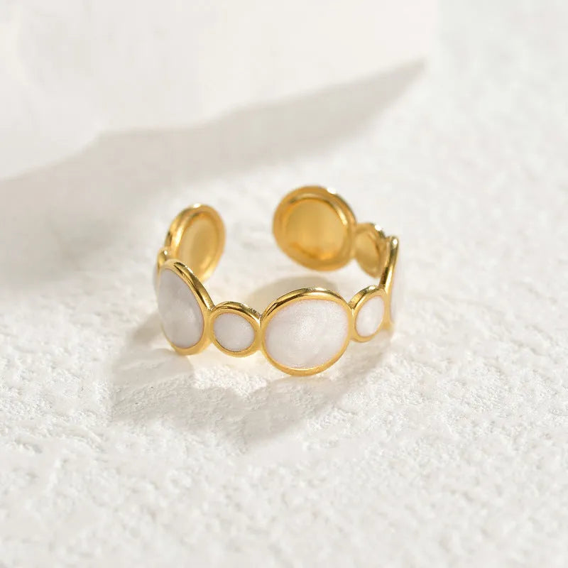 A geometric-shaped stainless steel ring with an adjustable opening and a shiny electroplated finish.