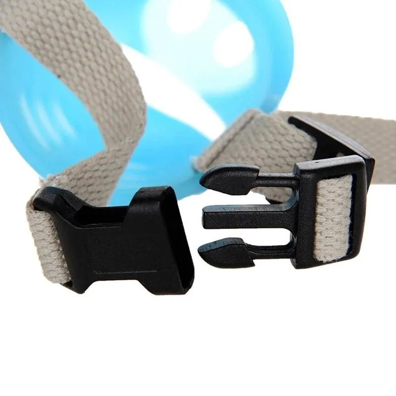 Silicone dog anti-bite mouth cover in blue and green colours showing two size options