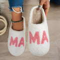 White plush cotton slippers with thick non-slip TPR sole on indoor floor