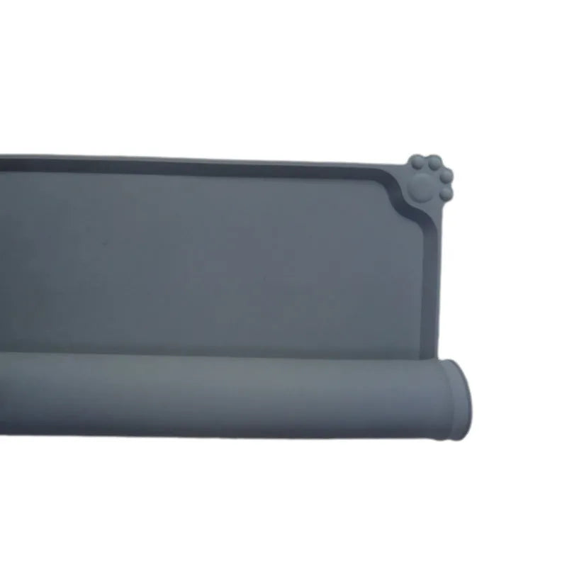 Waterproof silicone pet feeding mat in grey with non-slip base and raised edges, size 47x29.5cm