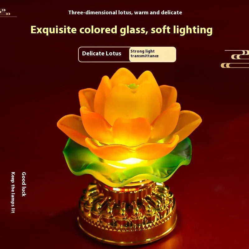A yellow Chinese-style lotus Buddha lamp made of ABS plastic on a wooden surface.
