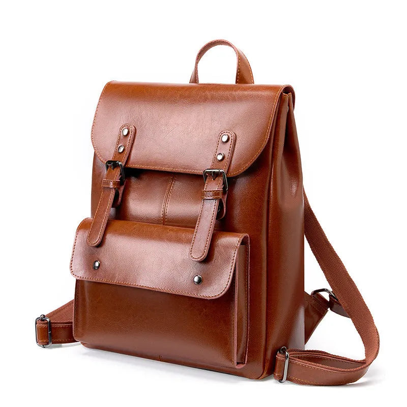 Hard cowhide leather computer backpack in black, brown, or coffee with lining cloth interior