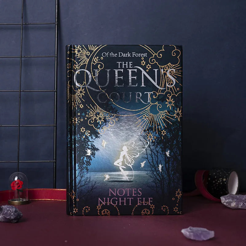 Blue A5 luminous hardcover notebook open to show full-colour illustrated pages.