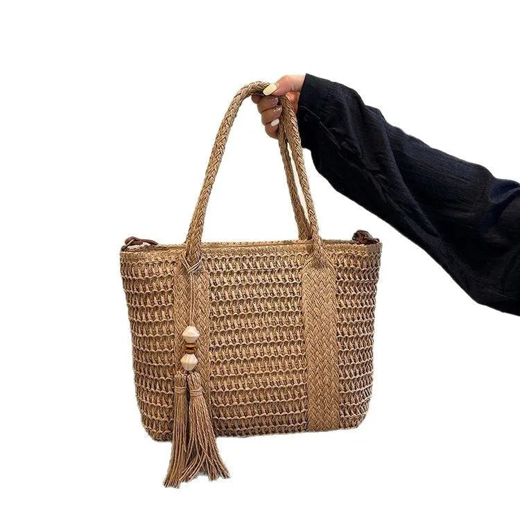 Women's portable straw crossbody bag in milky white colour with diagonal woven pattern