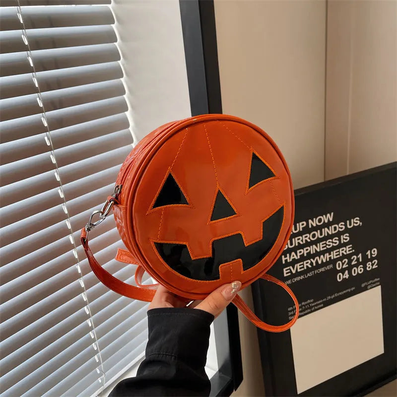 Small round pumpkin crossbody bag in PU, 18 x 18 x 7cm, shown in orange, black, and white