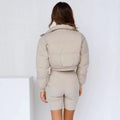 A woman's loose-fitting long sleeve polyester jacket in a choice of colours.