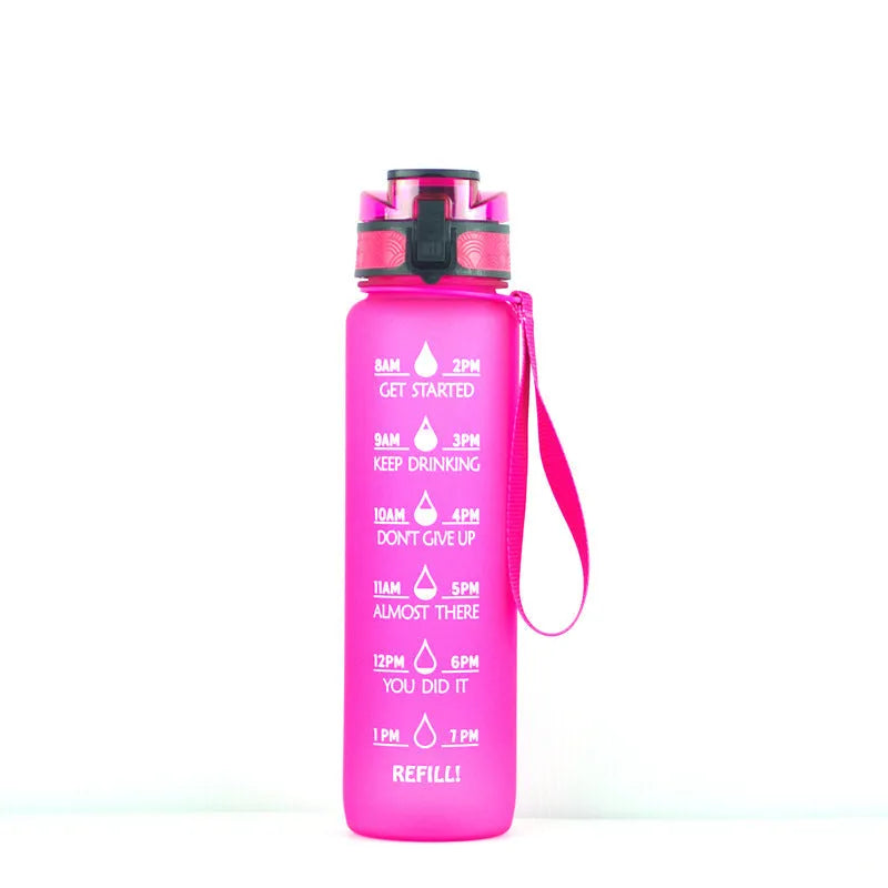 Transparent 1000ml plastic water bottle showing clear Tritan construction with visible liquid