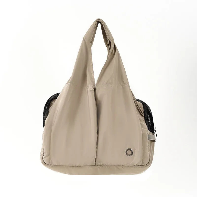 Apricot cloth pet summer handbag with adjustable strap, dimensions 41x16x28cm.
