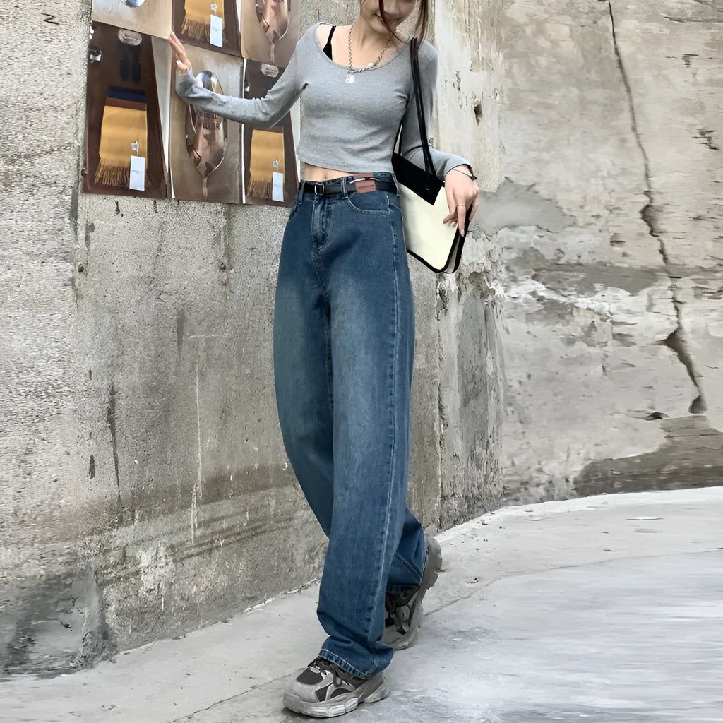 Women's retro blue straight-leg jeans with a high waist on a hanger.