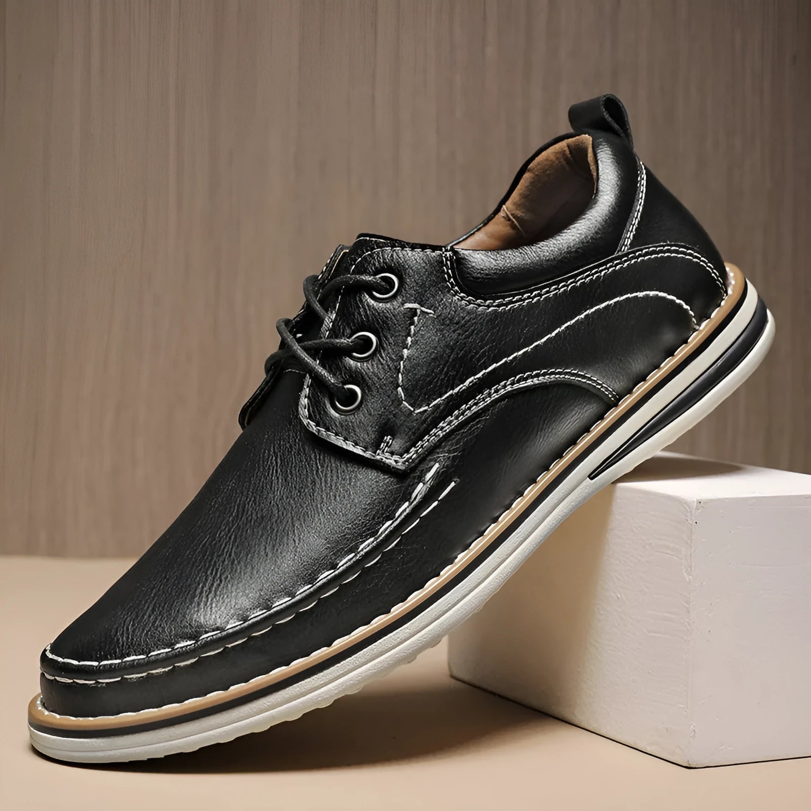 Men's black genuine leather lace-up casual shoes with round toe and rubber sole on a white background