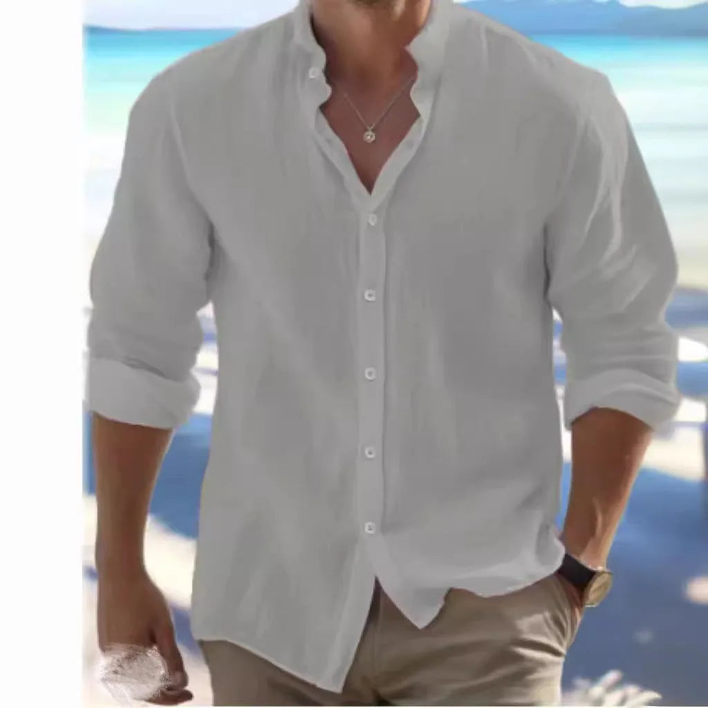 Man wearing a light grey long-staple cotton casual button-up summer shirt.