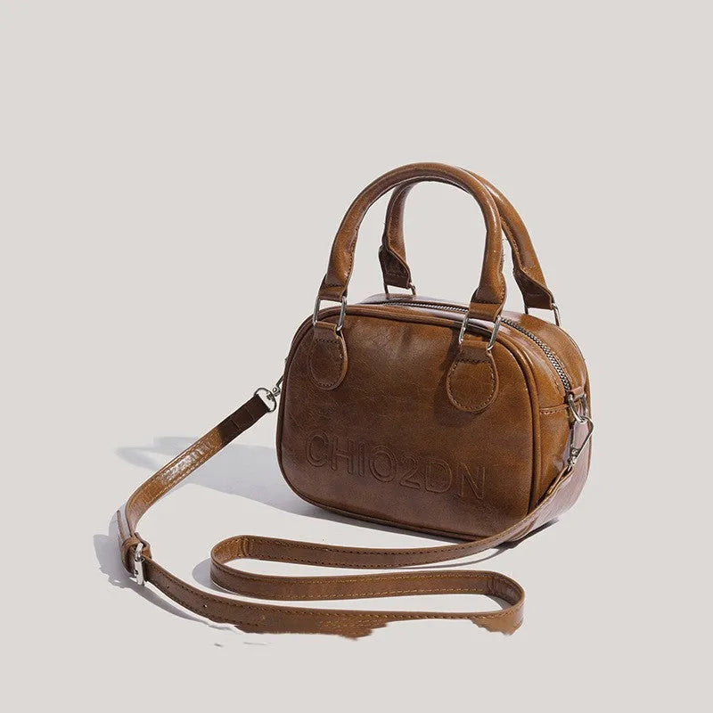 Retro easy matching shoulder crossbody bag in black or brown with letter and stitching design