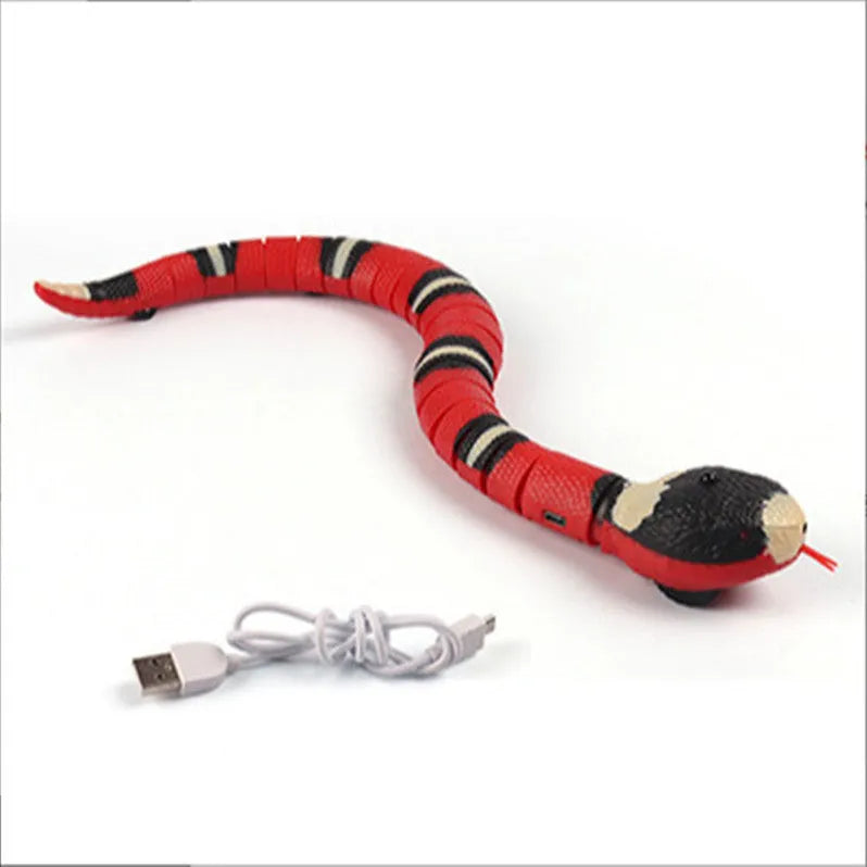 Interactive electric induction snake cat toy with S-shaped crawling and flashing eyes on a carpet