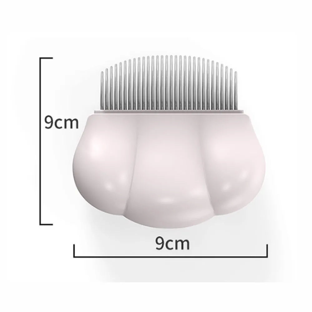 Paw Soft deshedding brush for pets in blue, pink, or white, measuring 9cm by 9cm.