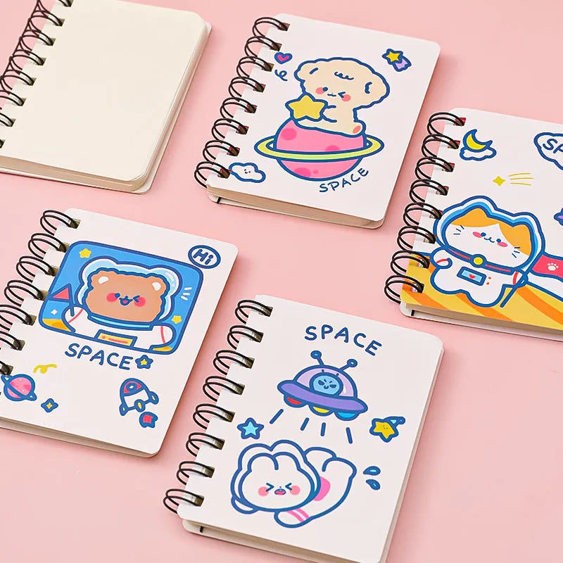 Astronaut Series portable pocket flipper notebook showing one of four cover designs: Astronaut Bear, Planet Teddy, Space Cat, or UFO.