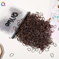 Children's disposable hair rubber bands 1000pcs strong pull cartoon design assorted colours deep coffee glittering powder grass green
