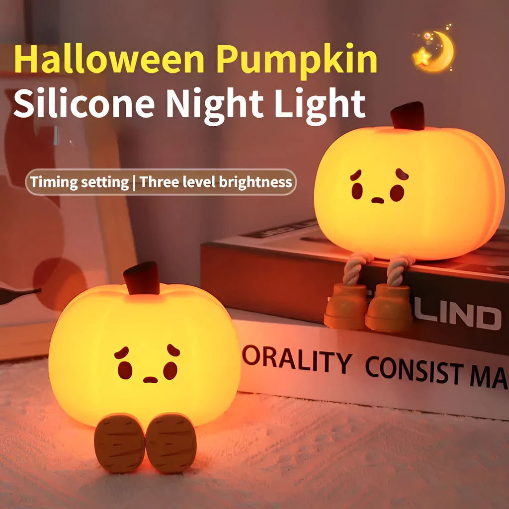 Soft orange silicone pumpkin-shaped night light with a warm glowing light.