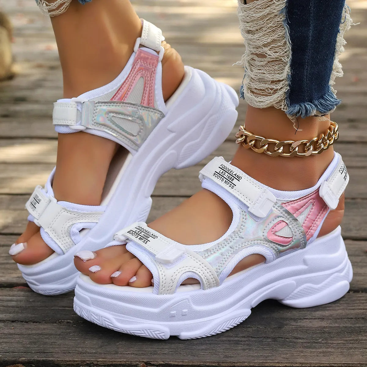 Women's white PU Roman platform sandals with a rubber sole on a plain background.
