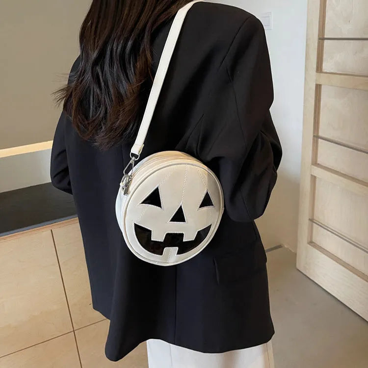 Small round pumpkin crossbody bag in PU, 18 x 18 x 7cm, shown in orange, black, and white