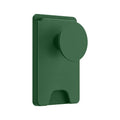 Black magnetic phone airbag holder on office desk with Apple iPhone