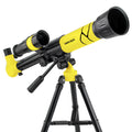 White kids astronomical telescope on tripod with smartphone attached for celestial observation