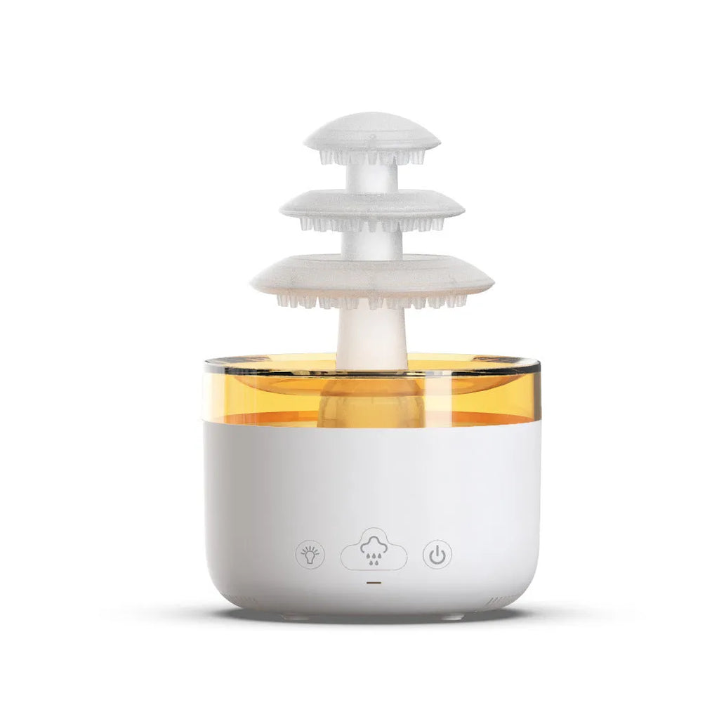 White Cloud Rain air humidifier and essential oil diffuser with colourful LED lights on a wooden table.