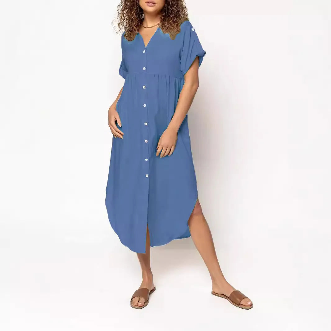 A loose-fitting mid-length casual dress with a button-down front, shown in a solid colour.