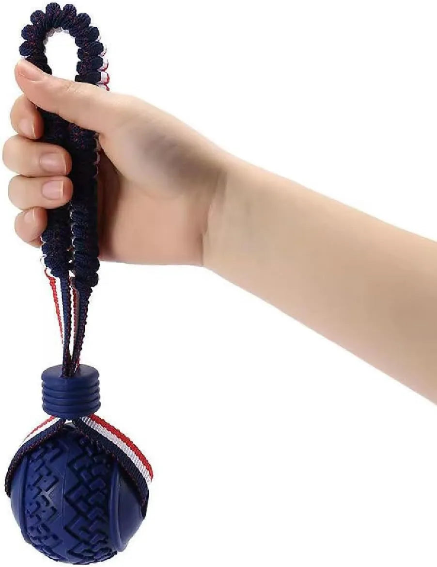 Blue or red natural rubber dog ball with attached rope toy for small and medium breed dogs