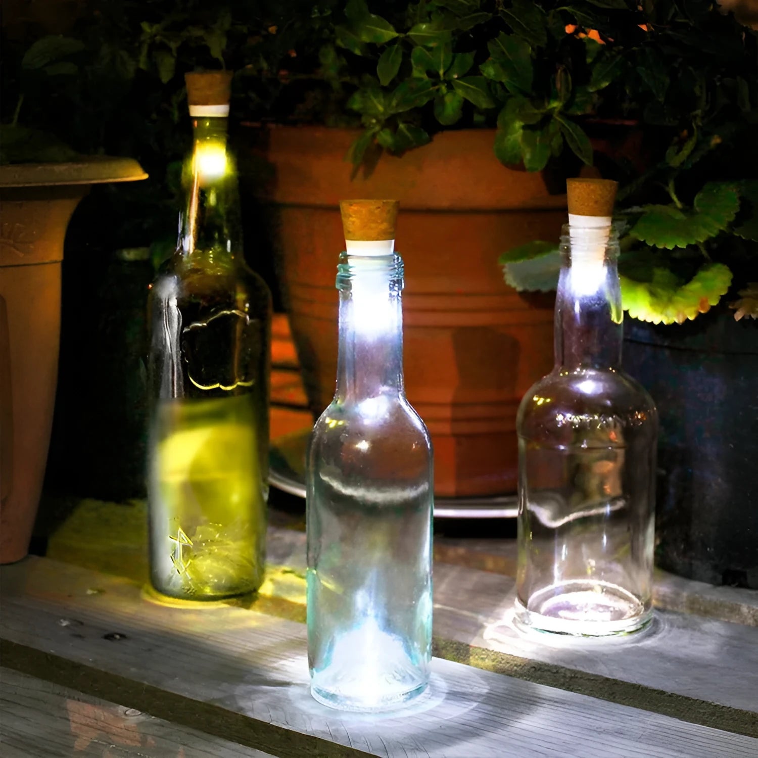 White plastic LED rechargeable luminous bottle cap cork light with integrated cork, shown on a wine bottle