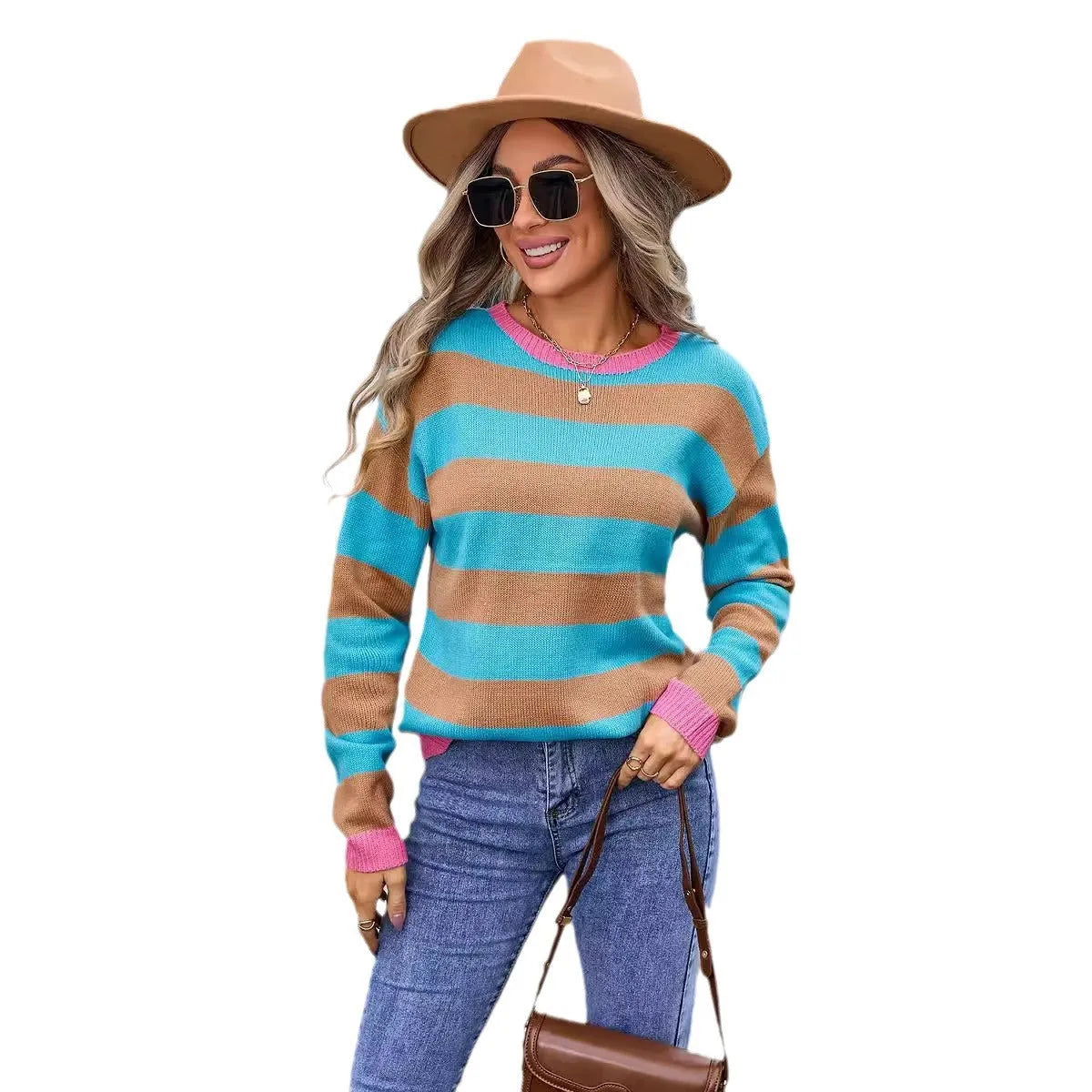 Women's loose blue acrylic sweater with long sleeves and a striped pattern on a hanger.
