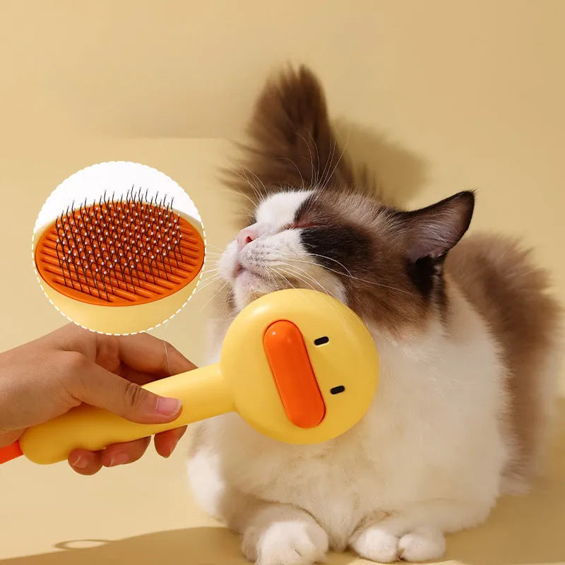 Small yellow duck comb for pet grooming with needle teeth and open section design