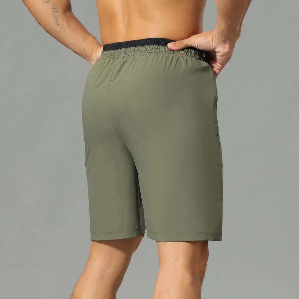 Men's loose grey cropped workout pants with quick-drying Ice Silk fabric for running and sport