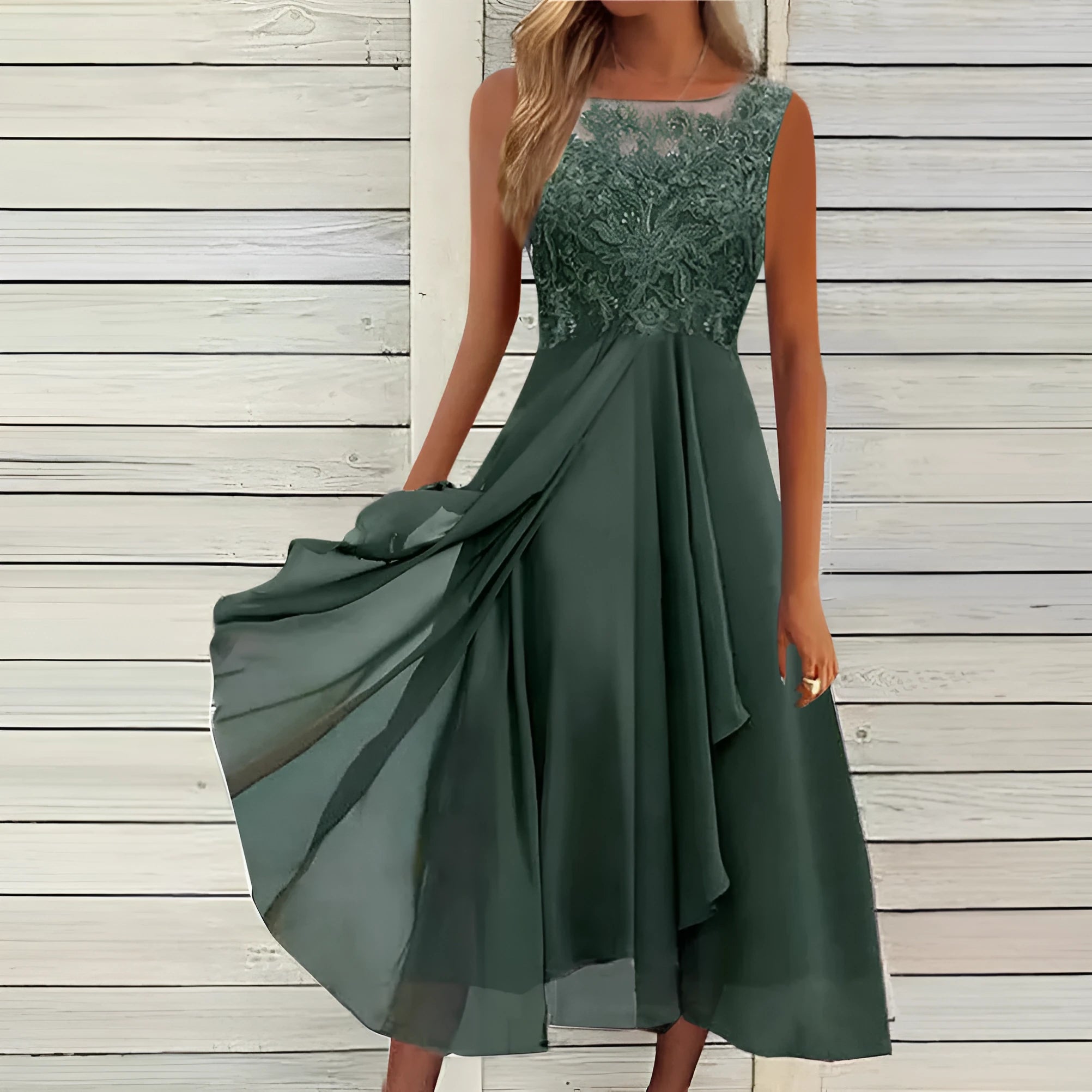 Women's sleeveless green chiffon dress with white lace hollow-out detail, mid-length skirt.